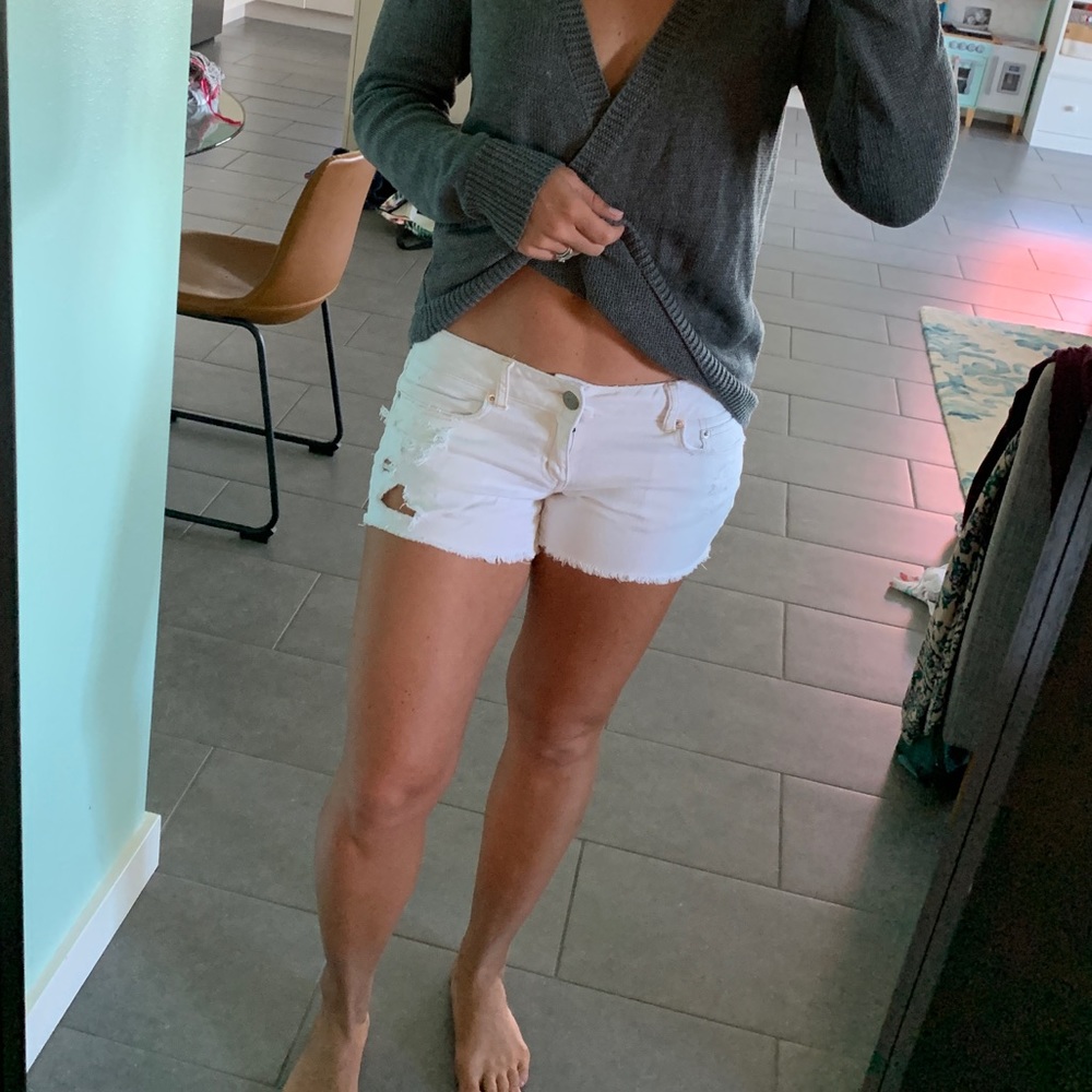 White distressed shorts